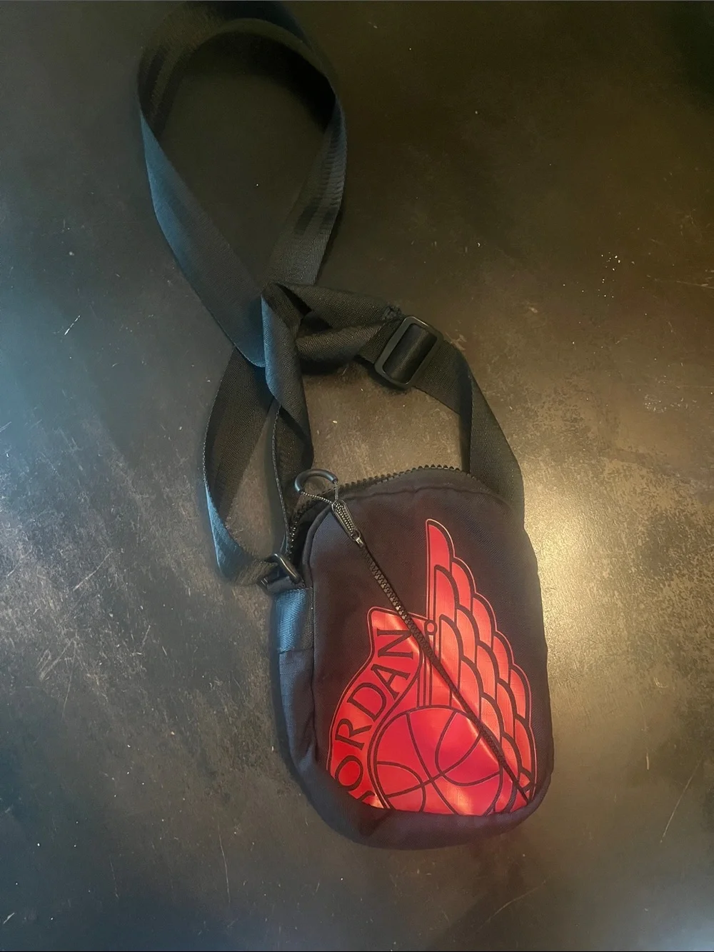 Jordan Black Crossbody Pouch with Red Wing Logo